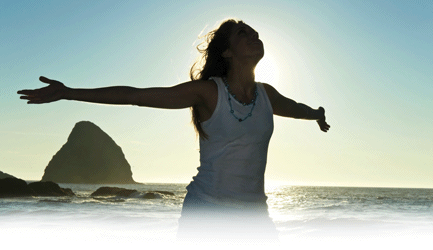 woman enjoying run on beach